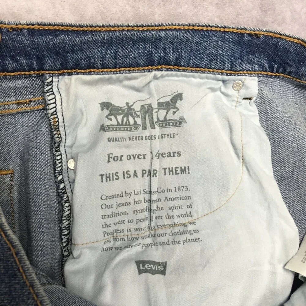 Levis Mens 505 Regular Fit Blue Jeans size 42x32 Stretch Denim Pants Cool Fading